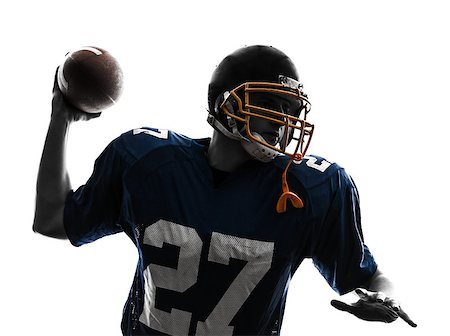 one caucasian quarterback american throwing football player man in silhouette studio isolated on white background Foto de stock - Super Valor sin royalties y Suscripción, Código: 400-07097589