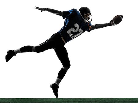 simsearch:400-08335037,k - one caucasian american football player man scoring touchdown   in silhouette studio isolated on white background Foto de stock - Royalty-Free Super Valor e Assinatura, Número: 400-07097591