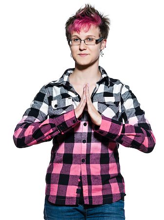 Portrait of a young expressive woman greeting Namaste in studio on white isolated background Stock Photo - Budget Royalty-Free & Subscription, Code: 400-07097742