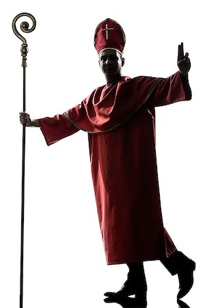priest blessing - one man cardinal bishop silhouette saluting blessing in studio isolated on white background Stock Photo - Budget Royalty-Free & Subscription, Code: 400-07097787