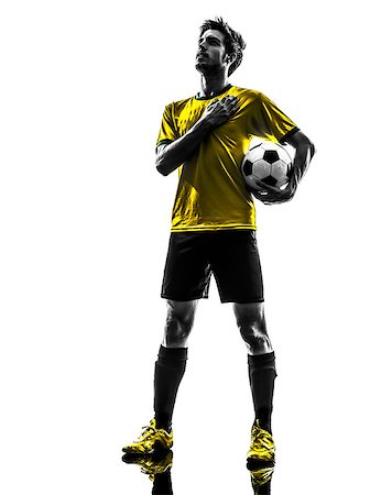 simsearch:400-07103133,k - one brazilian soccer football player young man standing in silhouette studio  on white background Stock Photo - Budget Royalty-Free & Subscription, Code: 400-07097887