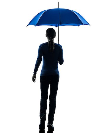silhouette girl with umbrella - one caucasian woman rear view walking  holding umbrella  in silhouette studio isolated on white background Stock Photo - Budget Royalty-Free & Subscription, Code: 400-07097968