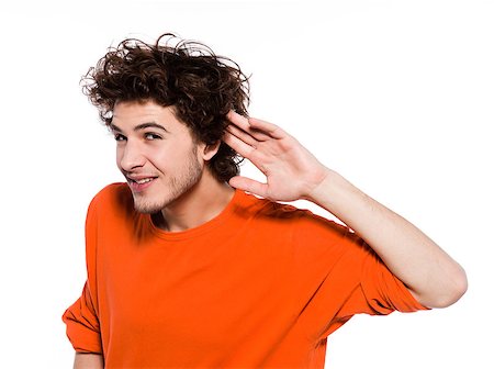 simsearch:694-03333054,k - young expressive caucasian man portrait in studio on white background with his hand in the back of the ear Foto de stock - Super Valor sin royalties y Suscripción, Código: 400-07097995