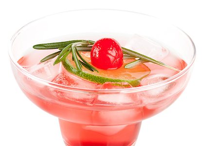 simsearch:400-06913386,k - Red alcohol cocktail with lime slice, maraschino and rosemary Stock Photo - Budget Royalty-Free & Subscription, Code: 400-07098126