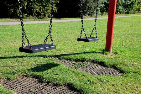 swing set nobody - Two empty swing seats on a sunny day Stock Photo - Budget Royalty-Free & Subscription, Code: 400-07098336