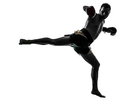 one caucasian man exercising thai boxing in silhouette studio  on white background Stock Photo - Budget Royalty-Free & Subscription, Code: 400-07098899