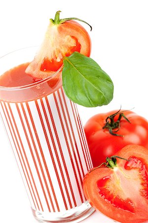 simsearch:400-06915457,k - Fresh tomato juice with basil isolated on white background Photographie de stock - Aubaine LD & Abonnement, Code: 400-07099051