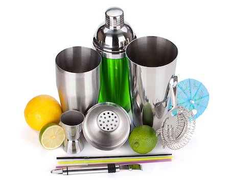 simsearch:400-06914551,k - Cocktail shaker, strainer, measuring cup, drinking straws and citruses. Isolated on white background Stock Photo - Budget Royalty-Free & Subscription, Code: 400-07099064