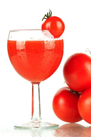 Fresh tomato juice with tomatos Photographie de stock - Aubaine LD & Abonnement, Code: 400-07099174