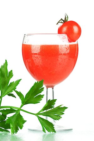 Fresh tomato juice with tomatos and celery Stock Photo - Budget Royalty-Free & Subscription, Code: 400-07099170