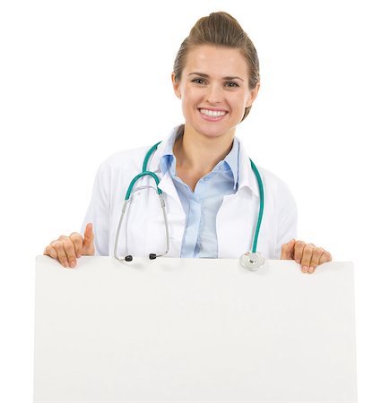 simsearch:400-05745246,k - Smiling doctor woman showing blank billboard Photographie de stock - Aubaine LD & Abonnement, Code: 400-07099825
