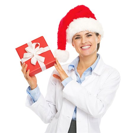 simsearch:400-07099823,k - Happy doctor woman in santa hat showing christmas present box Stock Photo - Budget Royalty-Free & Subscription, Code: 400-07099866