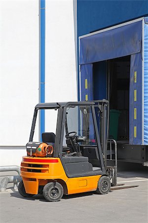 simsearch:400-07478249,k - Forklift at distribution warehouse loading dock Stock Photo - Budget Royalty-Free & Subscription, Code: 400-07090158