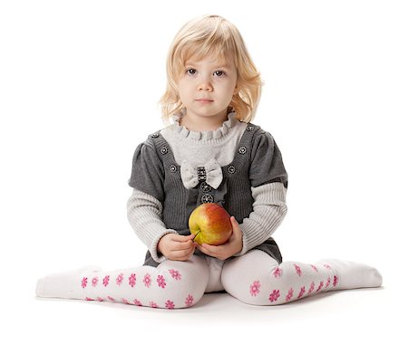 Baby girl with apple. Isolated on white background Stock Photo - Budget Royalty-Free & Subscription, Code: 400-07090496