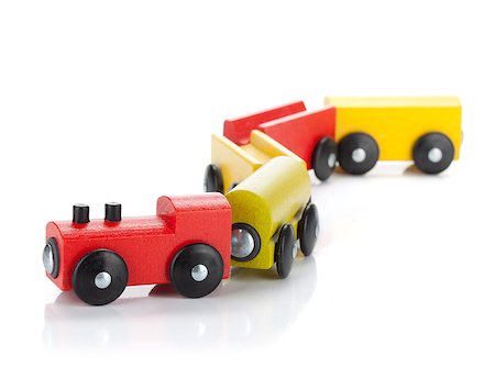 simsearch:400-05292821,k - Wooden toy colored train. Isolated on white background Stock Photo - Budget Royalty-Free & Subscription, Code: 400-07090513