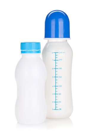Baby yoghurt and milk bottle. Isolated on white background Stock Photo - Budget Royalty-Free & Subscription, Code: 400-07090528