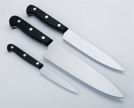 simsearch:400-05895238,k - Three kitchen knives. Blue toned Stockbilder - Microstock & Abonnement, Bildnummer: 400-07090550