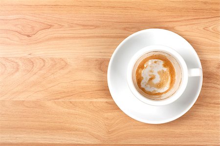 simsearch:400-07477800,k - Empty coffee cup on wood table Fotografie stock - Microstock e Abbonamento, Codice: 400-07090664