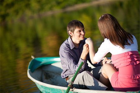 couple in a boat outdoors Stock Photo - Budget Royalty-Free & Subscription, Code: 400-07090768