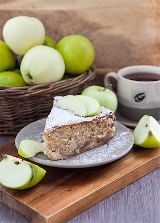 simsearch:400-04709493,k - Piece of homemade apple pie with cinnamon and apples on the background Stock Photo - Budget Royalty-Free & Subscription, Code: 400-07090833