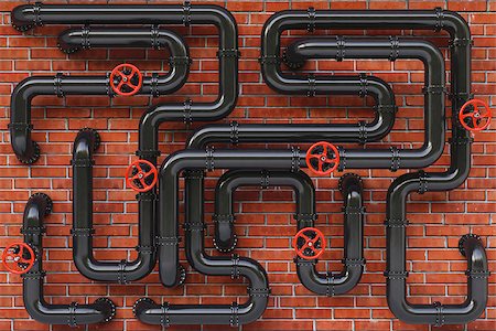 simsearch:400-06920325,k - Black oil pipes on a brick wall. Stock Photo - Budget Royalty-Free & Subscription, Code: 400-07091364