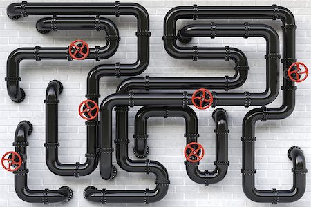 simsearch:400-06920325,k - Black oil pipes on a brick wall. Stock Photo - Budget Royalty-Free & Subscription, Code: 400-07091362