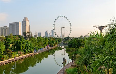 Singapore skyline view from tropical park at Gardens by the Bay with Singapore Flyer on background Photographie de stock - Aubaine LD & Abonnement, Code: 400-07091574