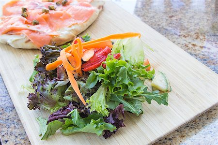 simsearch:400-06798929,k - Organic Vegetable Salad with Greens Carrot Strawberry and Smoked Salmon on Focaccia Bread Closeup Stock Photo - Budget Royalty-Free & Subscription, Code: 400-07092898