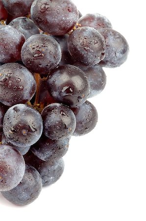 simsearch:400-08012355,k - Half of Ripe Dark Red Grape Bunch isolated on white background Photographie de stock - Aubaine LD & Abonnement, Code: 400-07092913