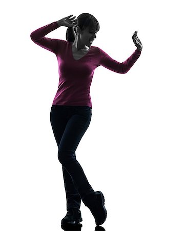 simsearch:400-07218974,k - one caucasian woman happy dancing  in silhouette studio isolated on white background Stock Photo - Budget Royalty-Free & Subscription, Code: 400-07093035