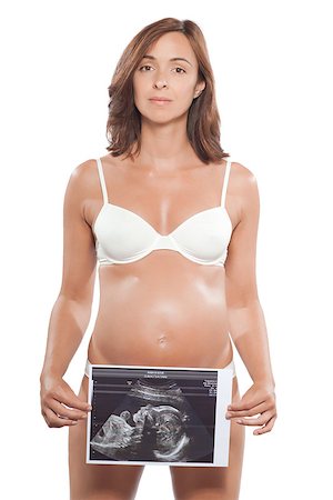 pregnant scan - caucasian pregnant woman showing holding ultrasound scan picture isolated studio on white background Stock Photo - Budget Royalty-Free & Subscription, Code: 400-07093031