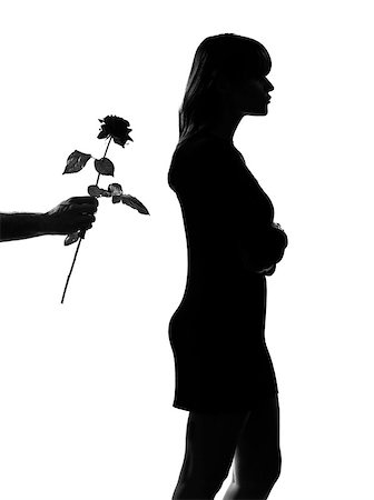 simsearch:400-07097695,k - man hand offering a flower rose stylish sexy silhouette caucasian beautiful woman on studio isolated white background Stock Photo - Budget Royalty-Free & Subscription, Code: 400-07093119