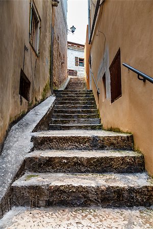 Narrow Street in the Medieval City of Rovinj, Istria, Croatia Stock Photo - Budget Royalty-Free & Subscription, Code: 400-07093145