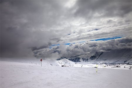 simsearch:400-04588712,k - Ski slope at bad weather. Georgia, ski resort Gudauri. Caucasus Mountains. Wide-angle view. Stock Photo - Budget Royalty-Free & Subscription, Code: 400-07093257
