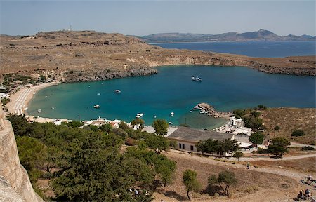 View from above of the main water sea beach in Lindos on the Island of Rhodes Greece photo. Travel concept. Stock Photo - Budget Royalty-Free & Subscription, Code: 400-07093395