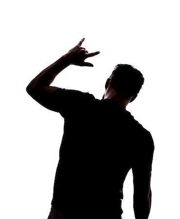 Man rocking on in silhouette isolated over white background Photographie de stock - Aubaine LD & Abonnement, Code: 400-07093445