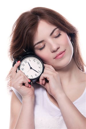 svetography (artist) - Young beautiful woman with eyes closed holding alarm clock Foto de stock - Royalty-Free Super Valor e Assinatura, Número: 400-07093522