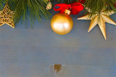 simsearch:400-07114074,k - fir tree with christmas decorarions on blue wooden background Stock Photo - Budget Royalty-Free & Subscription, Code: 400-07104616