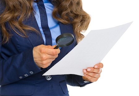 reports white background - Closeup on business woman examining document using magnifying glass Stock Photo - Budget Royalty-Free & Subscription, Code: 400-07105141