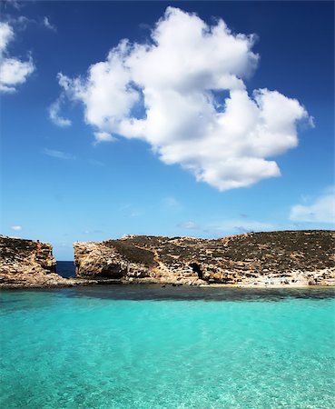 This is a photo of blue sea and sky, Blue Lagoon, Malta Foto de stock - Royalty-Free Super Valor e Assinatura, Número: 400-07105173