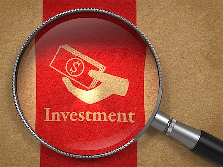 roi - Investment Concept: Magnifying Glass with Word  Investment and Icon of Money in the Hand on Old Paper with Red Vertical Line Background. Fotografie stock - Microstock e Abbonamento, Codice: 400-07105969