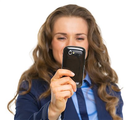 simsearch:400-07106831,k - Closeup on business woman taking photo with cell phone Stockbilder - Microstock & Abonnement, Bildnummer: 400-07106794