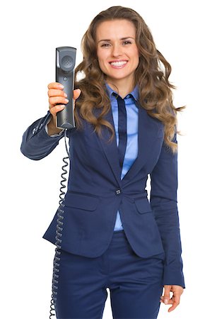 simsearch:400-07106831,k - Smiling business woman giving phone handset Stockbilder - Microstock & Abonnement, Bildnummer: 400-07106798