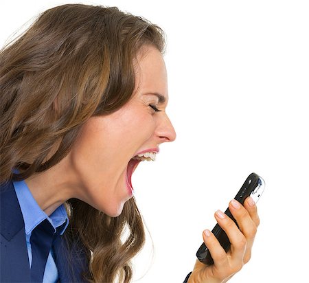 simsearch:400-06642775,k - Angry business woman shouting in mobile phone Photographie de stock - Aubaine LD & Abonnement, Code: 400-07106791