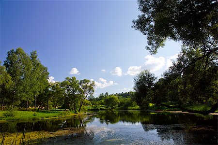 simsearch:400-07107314,k - Summer landscape with a river and grass on the coast Fotografie stock - Microstock e Abbonamento, Codice: 400-07107858