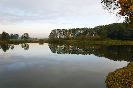 simsearch:400-07107314,k - Autumn landscape with water and reflection of clouds Fotografie stock - Microstock e Abbonamento, Codice: 400-07107863