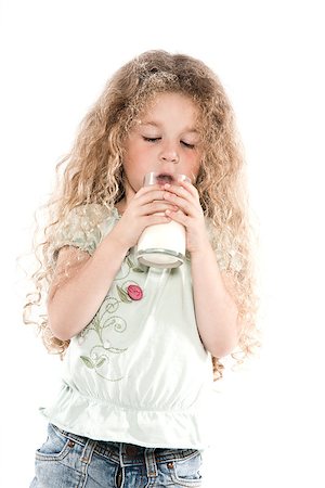 simsearch:400-04218582,k - caucasian little girl portrait drinking milk isolated studio on white background Stockbilder - Microstock & Abonnement, Bildnummer: 400-07100667