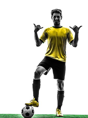 simsearch:400-07973189,k - one brazilian soccer football player young man standing saluting in silhouette studio  on white background Stock Photo - Budget Royalty-Free & Subscription, Code: 400-07100742