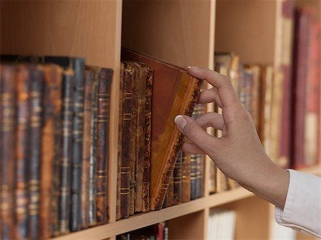 simsearch:400-08031960,k - woman hand holding ancient book Stock Photo - Budget Royalty-Free & Subscription, Code: 400-07100770