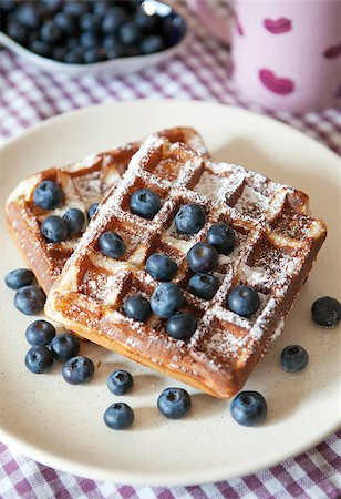 simsearch:400-06698338,k - Breakfast with belgian waffles and fresh blueberry on checkered tablecloth Stock Photo - Budget Royalty-Free & Subscription, Code: 400-07100977